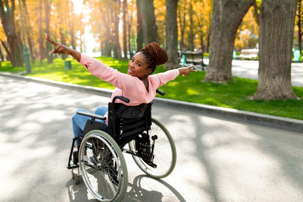 Young disabled black woman in wheelchair