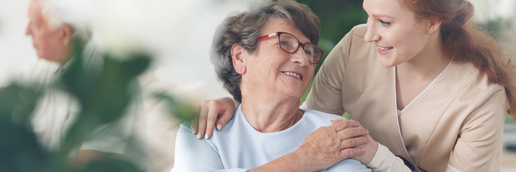 helpful caregiver comforting